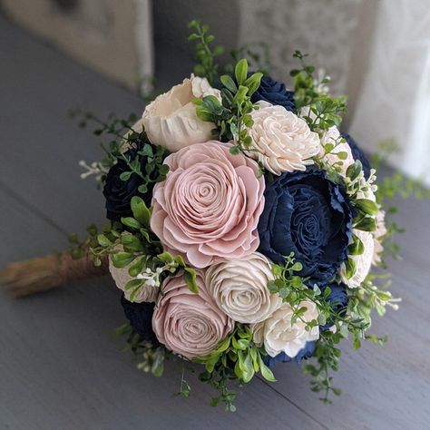 "Please Read Entire Description Before Purchase Bouquet with sola wood flowers in ivory, navy, and blush, with faux mixed greenery. Flower styles can and will vary based on current inventory levels and to keep orders unique, so they are not exact duplicates. Please include your choice of stem wrap and color (color of ribbon, white or ivory lace, or twine) in the notes section. Size pictured is an extra large (approximately 10\" in diameter). Bouquets listed in the Etsy shop are not eligible for Ivory Bouquet, Renewal Vows, Wood Flower Bouquet, Navy And Blush, Ribbon White, Bouquet Preservation, Wedding Renewal, Brides Bouquet, Bouquet Toss