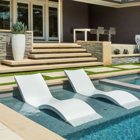 Relaxing on these in pool chaises is the perfect way to spend the afternoon Ledge Lounger, Pool Chaise, Living Pool, Tanning Ledges, Water Feature Wall, Leisure Pools, Pool Lounge Chairs, House Backyard, Pool Chairs