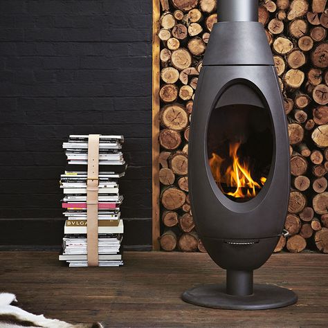 10 wood-burning stoves that will make you want to ditch your furnace Curved Fireplace, How To Clean Burners, Modern Wood Burning Stoves, Standing Fireplace, Stoves For Sale, Wood Heater, Freestanding Fireplace, Wood Fireplace, Home Fireplace