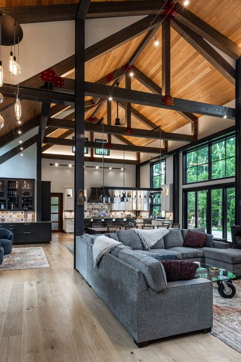 We can't get enough of this gorgeous modern mountain home! Large windows illuminate the space with natural light, and red gusset plates bring a subtle yet unique touch to the timber frame. Modern Timber Frame Homes, Modern Timber Frame, Timber Frame Home Plans, Side Ideas, Timber Frame Home, Lake Side, Modern Mountain Home, Timber Frame Homes, Timber Construction