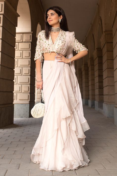 Pearl Drop Blouse with Chiffon and Organza Ruffled saree Fabric: Raw Silk, Chiffon and Organza Color: Pale Pink Product Code: RMOH 03