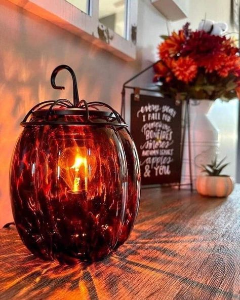 Scentsy Warmer of the Month October 2022 The most mystical pumpkin in the patch, this hand-blown glass warmer radiates a warm, cozy glow- with an edge. Removable decorative lid gives that just-picked feel. It is 8" tall and uses a 25W bulb; clear bulb included. Eye Pumpkin, Join Scentsy, Scent Warmers, Month October, Scentsy Fragrance, October 2022, The Harvest, Tigers Eye, Tiger's Eye