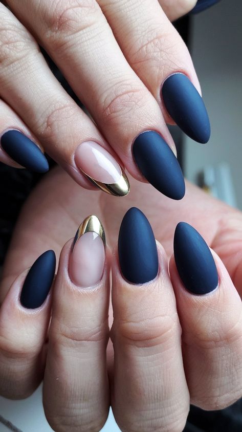 Elevate your nail game with this stunning matte navy and gold accent manicure! Featuring a chic mix of matte nails and a glamorous gold tip, this design is both elegant and modern. The unique nude accent nail adds a trendy twist, making it perfect for any occasion. Get inspired to try this sophisticated look! #NailArt #MatteNails #NailInspiration #septembernails #fallnails Navy Nails Gold Accent, Navy And Bronze Nails, Fall Nails Navy Blue And Gold, Matte Blue And Gold Nails, Elegant Navy Blue Nails, Navy And Copper Nails, Nails To Go With Navy Dress, Fall Navy Nails, Navy Blue Tips Nails