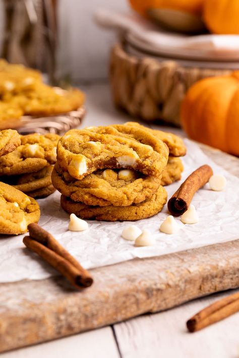 Bursting with pumpkin flavor and white chocolate chips, these pumpkin white chocolate chip cookies are an easy and delicious fall dessert. Pumpkin Black And White Cookies, White Chocolate Chip Pumpkin Cookies, Cranberry Pumpkin Cookies, Pumpkin White Chocolate Chip Cookies, Pumpkin White Chocolate, Pumpkin Pie Mix, White Chocolate Chip, White Chocolate Chip Cookies, White Chocolate Cookies