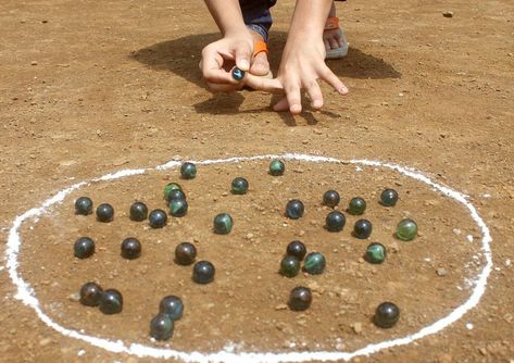 Native American Games, Indian Games, Playing Marbles, Village Games, Indian Drawing, Indians Game, Childhood Memories Art, Door Games, 90s Memories