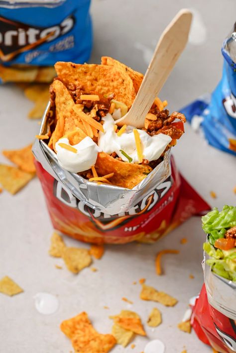 Handheld and tasty, this Doritos Walking Taco recipe is your new favorite portable snack! This is an easy way to turn a bag of chips into a mini taco bowl that you can take on the go. Mexican Snack Foods, Walking Tacos Recipe, Taco In A Bag, Doritos Taco, Mini Taco, Walking Taco, Taco Bowl, Walking Tacos, Sacred Woman