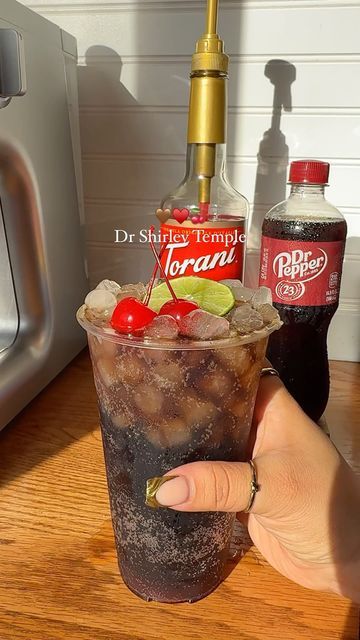 Ady & Ceci 🍒🪩🍉 on Instagram: "Dr Pepper Shirley temple 🤎♥️🍒  #drinks #shirleytemple #drpepper #drpeppershirleytemple #drshirleytemple #iceddrinks" Dr Pepper Dirty Soda Recipes, Dirty Dr Pepper Recipe, Dr Pepper Party, Dr Pepper Cocktail, Dirty Shirley Temple, Dirty Dr Pepper, Shirley Temple Drink, Dirty Shirley, Pepper Recipe