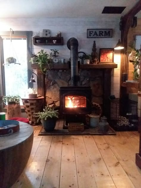 Mantel For Wood Burning Stove, Decorating Behind A Wood Stove, Wood Stove In Front Of Stairs, Wood Stove Surround Rustic Wall, Wood Stove Surround Wall Shelves, Woodburning Stoves Freestanding, Wood Stove With Stone Surround, Cozy Wood Stove, Decorating Around Wood Stove