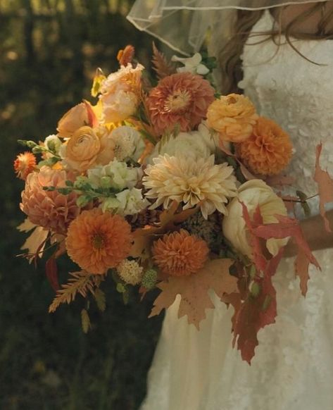 Fall wedding inspo Bridal bouquet with dahlias Fall Wedding Flowers Wildflowers, Wedding Flowers Chrysanthemum, Fall Wedding Romantic, Marigolds Wedding Bouquet, Bridgerton Fall Wedding Aesthetic, Orange And Green Wedding Bouquet, Early Fall Wedding Bouquets, Fall Bouquet Wedding October, Fall Boho Wedding Bouquet