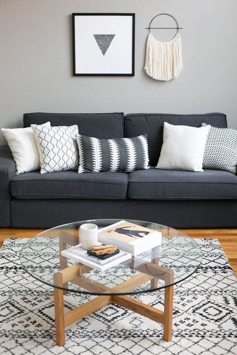 5 Fail-Proof Ways to Make Your Home Look More Expensive | Every once in a while, I get to visit a truly grand home in which every piece is obviously there on purpose, nothing is cobbled together, and there are no placeholders. I love these homes—especially because I love their residents—and have tried to find ways to incorporate what makes them work into my own decidedly more humble abodes. Here are five ways to fake fanciness, without looking cheap. Gray Sofa Living, Grey Sofa Living Room, Furnitur Ruang Keluarga, Grey Couch Living Room, Trendy Living Rooms, Simple Living Room, Home Design Decor, Living Room Grey, A Living Room