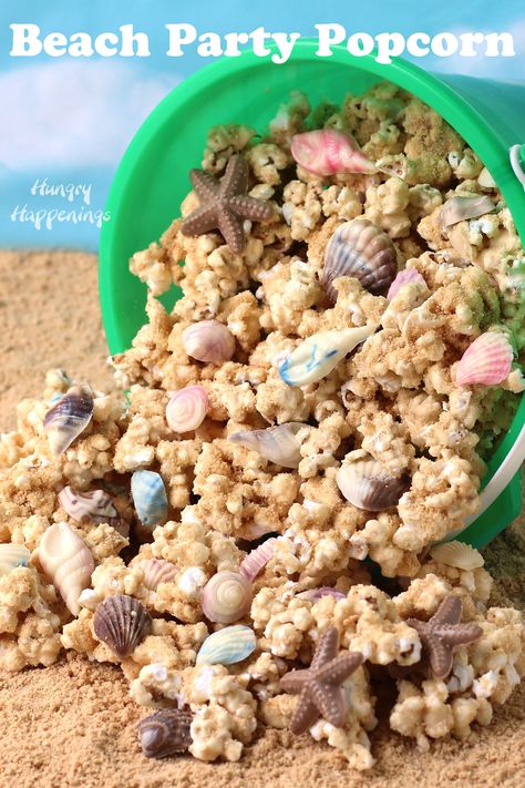 white chocolate peanut butter popcorn coated in cookie crumbs and filled with chocolate shells Beach Themed Desserts, Beach Theme Food, Beach Theme Desserts, Chocolate Peanut Butter Popcorn, Beach Dessert, Birthday Popcorn, Peanut Butter White Chocolate, White Chocolate Peanut Butter, Peanut Butter Popcorn