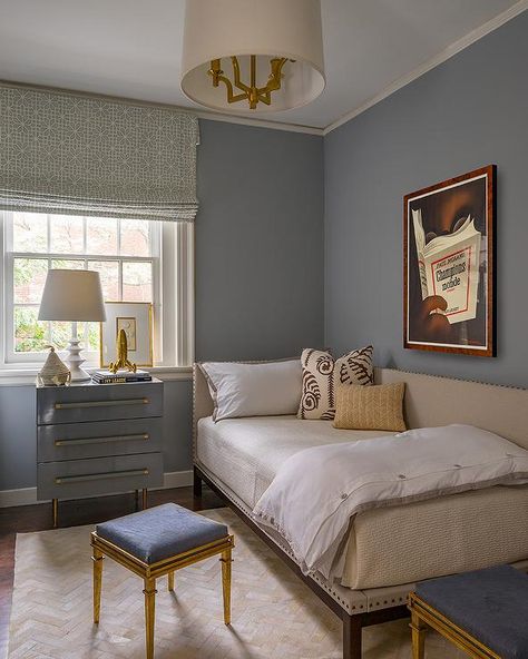 Blue lacquer nightstand against a bedroom window fitted with a Roman shade beside a twin corner bed dressed with tan bedding and a frame with nailhead trim. Blue Guest Bedroom, Bed Against Window, Bed Against Wall, Corner Twin Beds, Liz Caan, Boys Bedroom Green, Tan Bedding, Guest Bedroom Inspiration, Shared Girls Bedroom