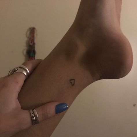 Small Heart Ankle Tattoo, Ankle Tattoos Simple, Ankle Tattoo Aesthetic, Heart On Ankle Tattoo, Heart Foot Tattoo, Ancle Tatoos Woman Simple, Ankle Stick And Poke Tattoo, Ankle Tattoo Heart, Ankel Tattoos Simple