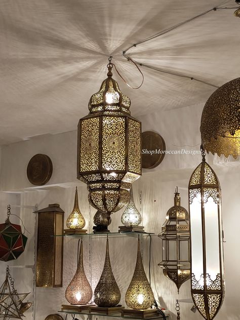 Moroccan chandelier, hanging Moroccan lantern, Moroccan light, pendant light, Moroccan lamp, housewarming gift, home lighting, home decor. This Moroccan light is perfect for your place to make it more Inviting and Luxurious. It casts a soft and a stunning pattern on the walls like an illuminated wallpaper. ~This Light is: High quality craftsmanship and premium brass. Easy to install and hang on ceiling. suitable for USA and Western wiring. Comes with the chain, canopy, and bulbs. ~Light Measurem Moroccan Chandelier, Moroccan Ceiling, Moroccan Ceiling Light, Moroccan Lantern, Diy Room Decor For Teens, Moroccan Lighting, Traditional Pendant Lighting, Moroccan Lamp, Moroccan Lanterns