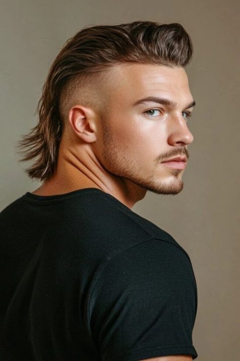 The Jungle Prince.
Untamed, wild, and rugged, this style brings a touch of the wilderness. The top remains slightly voluminous, with almost raw edges on the back. For those who exude confidence, this cut embodies the heart of a natural-born leader.
#MensStyle #ModernGentleman #Hair #Hairstyle #Haircut #MensGrooming #hairstylesforthinhair #buzzcut #messyfringe #haircuttingstyle #sassyhairolder #buzzcutmasculino #CurlyMouthwashing #ChristmasHairStyle #okarun #mouthwashing Unstyled Mohawk, Buzz Cut Mullet, Men's Mullet, Mullet Ideas, Mens Mullet, Mohawk For Men, Mullet Hairstyles, Mullet Fade, Male Hairstyles