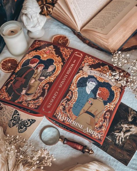 Hey, Book Owls! ⁠It’s time to reveal our March 🥀 DEFY THE DARK 🥀⁠ Adult Fantasy book! ⁠ ⁠ How beautiful is our Exclusive Edition of The Warm Hands of Ghosts by Katherine Arden (@arden_katherine)?! ⁠ ⁠ Our OwlCrate Exclusive Edition featured:⁠ 🖤 Exclusive redesigned dust jacket by @vera.drmanovski⁠ 🖤 Reversible dust jacket by @june_page⁠ 🖤 Foil hardcover case design by @divineliterary⁠ 🖤 Foiled end pages designed by @offthehookstudio⁠ 🖤 Sprayed edges⁠ 🖤 Signed by the author on a page designed ... The Warm Hands Of Ghosts, Katherine Arden, Adult Fantasy Books, Bookish Things, Fantasy Book, Case Design, Dust Jacket, Fantasy Books, Page Design