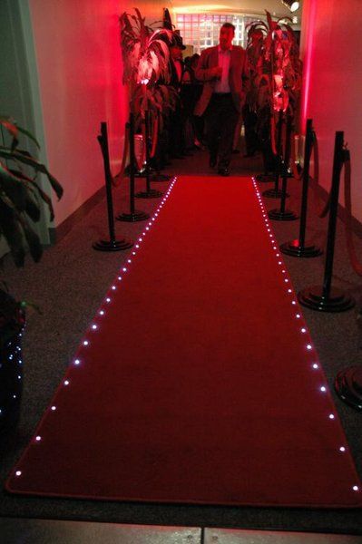 Red carpet lighting Red Carpet Decoration Ideas, Red Carpet Decorations, Red Carpet Entrance, Gala Themes, Prom Themes, Red Carpet Party, Vegas Theme, Casino Party Decorations, Casino Decorations