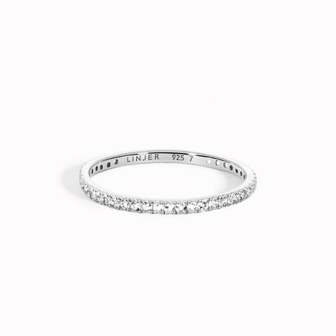 Our classic eternity ring dusted with 1.2mm white topaz stones on a silver band. Eternity Wedding Band, Topaz Stone, Ring Silver, White Topaz, Silver Band, Eternity Ring, Wedding Band, Ring Earrings, Topaz