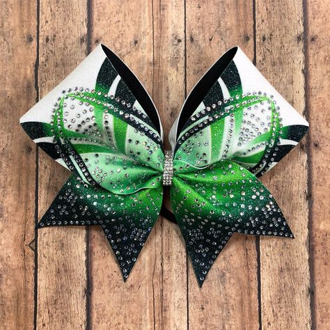 "Badda Bling Bows provides the highest quality bows on the market specializing in individual, practice and team bows and we uniform match. This gorgeous cheer bow is covered in high facet crystals! Sublimated on white glitter gives this gorgeous bow a beautiful sparkly effect with crisp vibrant color! Available in any color combo and any stone color. - FREE SHIPPING on all team orders. - Made with 3\" ribbon and premium nylon elastic hair bands that won't damage hair as they have no metal parts Competition Bows, Bling Bows, Damage Hair, Hair Bow Tutorial, Merritt Island, Bow Tutorial, Cheer Bow, Rhinestone Bow, Cheer Bows