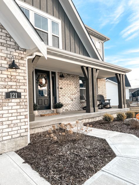 Black Farmhouse Exterior, Sw Tricorn Black, Brick Farmhouse Exterior, Modern Farmhouse Porch, Outside House Colors, Brick Farmhouse, Brick Porch, Farm Style House, Exterior House Siding