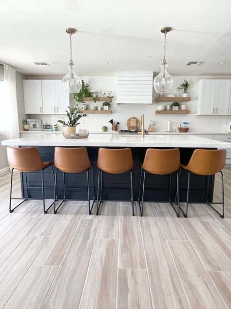 Black Island White Kitchen, Black White And Wood Kitchen Modern, Black Island White Countertop, White Kitchen With Accent Island, Kitchen White Black Wood, Black Shiplap Island Kitchen, Shiplap Under Bar Counter, Moody White Kitchen, White Gold Black Kitchen