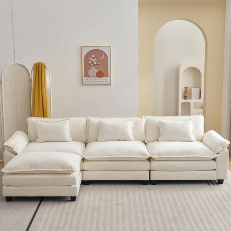 PRICES MAY VARY. A Dive Into Comfort: This comfy cloud couch sectional features 10.6" upholstered 2-layer seat cushions with high-resiliency foam and a 26.4" extra-deep seat to provide a soft and cozy feel Pillow Included: Each seat is equipped with a matching pillow and the armrest of the sectional sofa is like a pillow, so whether you're sitting down and relaxing or lying down and taking a nap, this comfy couch will perfectly match your lumbar and neck Quality And Durability: The frame of this Couches Living Room Comfy, Deep Sectional Sofa, L Shaped Sectional Sofa, Ottoman For Living Room, L Shaped Sectional, Deep Sectional, Living Room Beige, Cloud Couch, Sofa With Ottoman