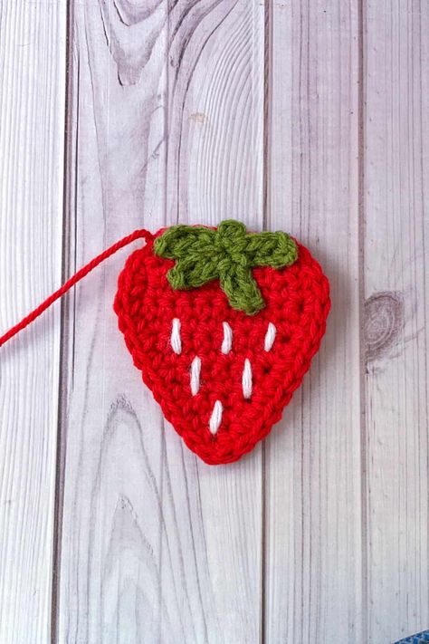 Crochet Strawberry Applique Pattern - thecaffeinatedsnail.com Crochet 2d Strawberry, Strawberry Applique Pattern, Crochet Strawberry Applique, 2d Crochet, Cute Crochet Strawberry, Strawberry Blanket, Winnie The Pooh Crochet, Backpack Patterns, Pooh Crochet