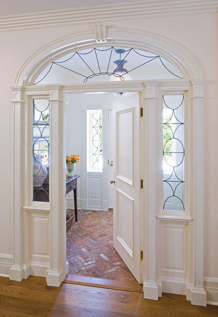 Reconsidering the Old-Fashioned Vestibule Traditional Entryway, Traditional Front Doors, Travertine Floors, Casa Country, Foyer Decorating, Foyer Design, Brick Flooring, Basement Flooring, Floor Seating