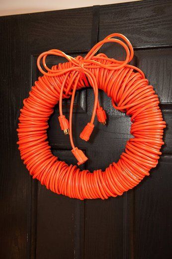 I need to make a couple of these!  Man wreath... I think I might do this in Christmas colors. That way he has a way to plug all his christmas lights in without all the extra cords hanging around Too funny mancave wreath Tacky Christmas, Construction Birthday Parties, Construction Party, Father's Day Diy, Construction Birthday, Diy Wreaths, Wreath Crafts, Wreath Ideas, Idea Diy