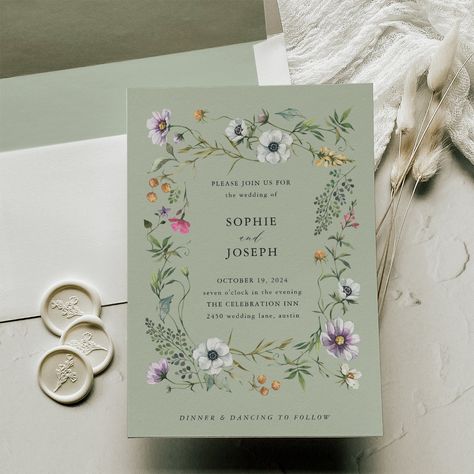 These whimsical wedding invitations feature a frame of illustrated, colorful pink, orange, purple and white wildflowers and green leaves on a soft green background. A simple design that is both boho and elegant. Soft Green Wedding, Wedding Wildflowers, Whimsical Wedding Invitations, Wildflower Wedding Theme, Purple And Green Wedding, Colorful Wedding Invitations, Wildflower Wedding Invitations, Sage Green Wedding, Green Wedding Invitations