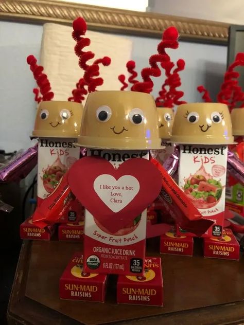 50+ Easy DIY Valentines Party Ideas for Kids - HubPages Valentines Robot Snacks, Valentine’s Day Juice Boxes, Valentines Juice Box Ideas, Prepackaged Valentine Snacks For School, Valentine Robot Juice Boxes, Valentine Daycare Gifts, Valentines Juice Box Ideas For Kids, Valentine Snacks For Kids School, Valentine Snack Ideas For Kids Classroom