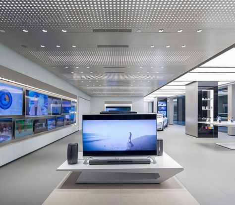 LeEco Experience Showroom using Formica® Laminate Metal Panel Ceiling, Mall Ideas, Electronic Store, Grey Floor Tiles, Showroom Display, Showroom Interior Design, Store Interiors, Products Ideas, Electronic Shop