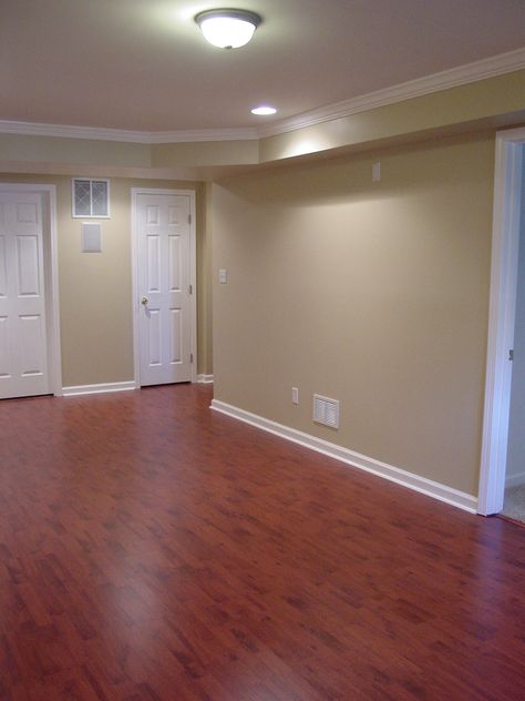 Lots of potential here in the basement! Benjamin Moore Putnam Ivory HC-39 wall color Wood Paneling Basement, Putnam Ivory, Wood Paneling Walls, Ivory Paint Color, Wood Furniture Bedroom Decor, Basement Wall Colors, Wood Paneling Decor, Paneling Walls, Painting Wood Cabinets