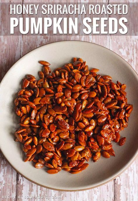 Sweet and spicy and completely irresistible, honey sriracha roasted pumpkin seeds are an addictive - but completely healthy - snack you can feel good about making at home. Recipe at SoupAddict.com #pumpkinseeds #srirachapumpkinseeds #roastedseeds Savory Pumpkin Seeds, Pumpkin Seed Recipes Roasted, Pumpkin Roasted, Spicy Pumpkin Seeds, Pumpkin Seeds Baked, Roasted Seeds, Sweet Pumpkin Seeds, Sriracha Recipes, Seed Recipes