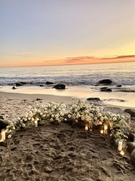 beach proposal, flowers on beach, beach engagement, beach proposal  ideas, beach proposal set up, beach sunset, coastal wedding, beach wedding, roses on beach, Proposal Sunset Ideas, Proposal With Flowers And Candles, Rose Beach Proposal, Married On The Beach, Beach Flower Proposal, Proposal Ideas California, Cottagecore Beach Wedding, Flowers In Sand Proposal, Proposal At The Beach Ideas