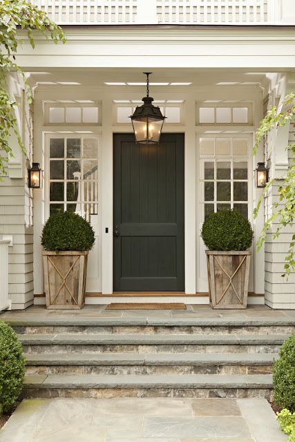 This is pretty much perfection in my book - oversized lantern, boxwood topiaries in weathered planters, transoms, natural stone incorporated in steps, black door, beautiful millwork & trim, Best Front Doors, Porch Planters, Entry Lighting, Farmhouse Front Door, Small Bedrooms, Farmhouse Front Porches, Front Door Entrance, Front Steps, Farmhouse Front