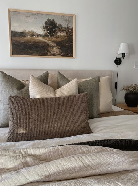 Cream Bed Brown Furniture, Linen Bedding Ideas Color Combos, Brown Bed Pillows, Beige Bedding With Color, Moody Bedroom Earth Tones, Dark Throw Pillows, Organic Master Bed, Cozy Dark Bedroom Aesthetic Vintage, Moody Bedroom Artwork