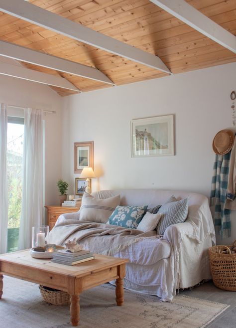 This Coastal Cottage Is Actually a 500-Square-Foot Studio Coastal Grandma Home, Coastal Grandmother Living Room, Coastal Cottage Interior, Nancy Meyers Interiors, Grandma Home Decor, Grandma Home, Sunroom Makeover, Coastal Cottage Living Room, Dreamy Cottage