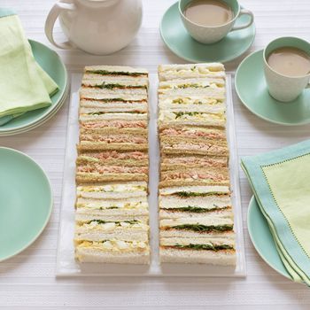 Learn to make traditional finger sandwiches with this collection of English tea sandwich recipes. It includes cucumber tea sandwiches and more. English Tea Sandwiches, Tea Party Menu, Tea Sandwich, Cucumber Tea Sandwiches, Tea Party Sandwiches, Tea Sandwiches Recipes, English Tea Party, Afternoon Tea Recipes, Party Sandwiches