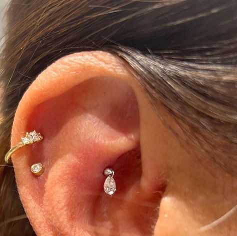 33 likes, 1 comments - highleydawn on May 1, 2023: "Fresh contra conch piercing done by me with a floating pear diamond 💎 from @mariatash with two fresh Jewelry installs ✨". Contra Conch Piercing, Contra Conch, Double Conch Piercing, Outer Conch Piercing, Outer Conch, Conch Hoop, Conch Piercing, Pear Diamond, May 1