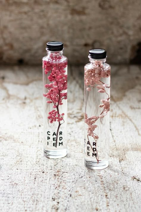 Flower In Glass Bottle, Herbarium Bottle, Pepper Berries, Flower Bottle, Pink Pepper, Unique Candles, Bottle Vase, Natural Cosmetics, Bottle Design