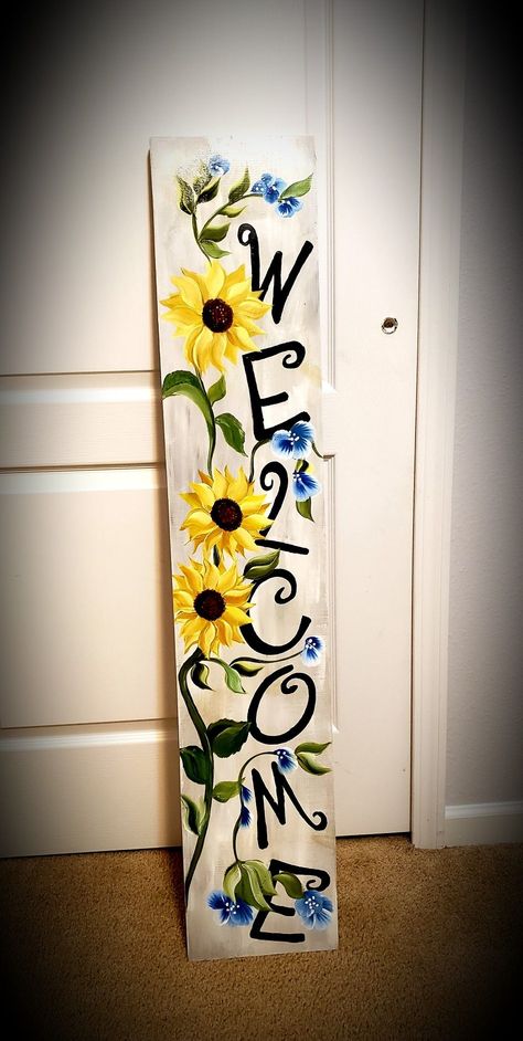 Welcome Signs With Sunflowers, Spring Painting Ideas On Wood, Wood Plank Signs Diy, Spring Porch Leaner Ideas, Spring Leaner Boards, Painting Boards Ideas Wood Signs, Porch Leaner Sign Diy, Porch Sitters, Painting On Wooden Board