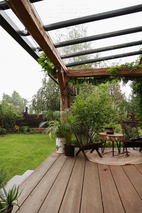 Wooden terrace in summer. A perfect northern terrace, but this year we needed additional sun protection. The terrace is made of larch boards, the poles are made of very old wood. The roof is glass. I love relaxing there, reading books, meeting friends and practicing yoga. Laundry dries well on it as well :) Wooden Pergola With Glass Roof, Wooden Terrace Roof, Terrace Glass Roof, Wooden Terrace Ideas, Open Terrace Ideas, Glass Terrace, Terrace Cover, Wood Terrace, Veranda Ideas