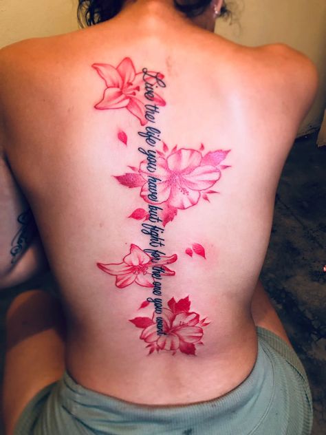 Cute Tattoos For A Lost Loved One, Back Tat Quotes, Unique Spine Tattoos For Women Flower, Japanese Cherry Blossom Spine Tattoo, Bible Back Tattoo, Flowers On Spine Tattoo, Spine Tats Red Ink, Red Flower Back Tattoo, Spine Tattoo Bible Verse