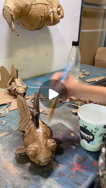 Laurence Vallières ® on Instagram: "Here is a very short timelapse of the creation of this tiny little fish that you can see right there. It is so small I am in love with it!   I always want to make longer reels but nobody gets to see them when I don’t edit them to the bone! I’m starting to think about a youtube channel. Seriously 😒" Cardboard Fish, Cardboard Art Projects, Paper Mache Crafts, Am In Love, Cardboard Art, Paper Mache, Art Projects, Fish, Canning