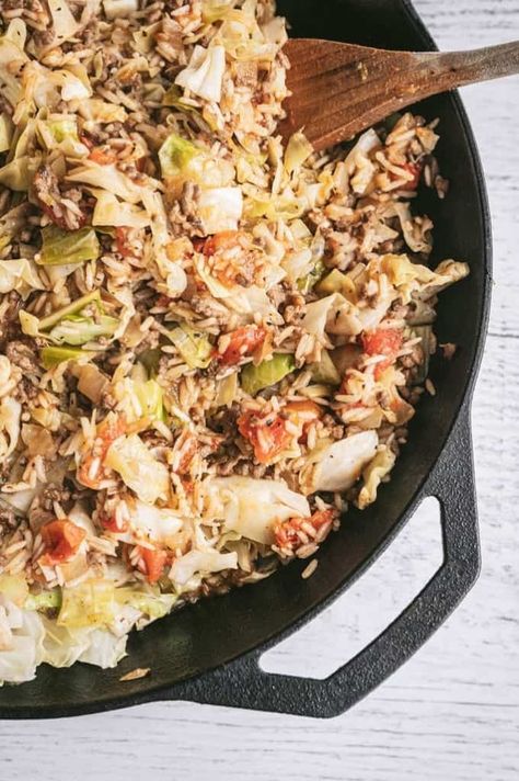 Cabbage Roll Rice - The perfect one-pot dinner! This delicious rice dish is filled with cabbage, ground beef, and a host of seasonings. Deconstructed Cabbage Rolls, Cabbage Ground Beef, Recipe Cabbage, Indulgent Recipes, Sweet And Sour Cabbage, Recipes Cabbage, Sour Cabbage, Weight Challenge, Cabbage Roll Casserole