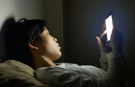 Woman scrolling on cell phone at night Scrolling Through Phone Aesthetic, Watching Phone At Night, Scrolling On Phone, Guy On Phone In Bed At Night, Staring At Phone, Smiling At Phone In Bed, Scrolling Through Phone, Person On Phone, Someone Sleeping