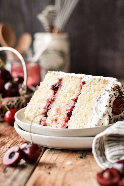 A high altitude tested recipe for white forest cake, with vanilla cake filled with cherry preserves and chocolate chip whipped cream frosting. High Altitude Cake Recipe, White Forest Cake, Cake Styling, High Altitude Baking, Cherry Preserves, Swiss Rolls, Cherry Filling, Photography Cake, White Forest