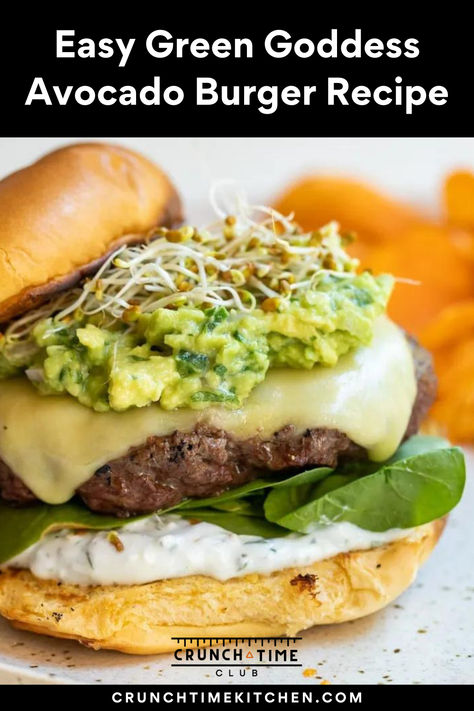 Green Goddess Burger. The ultimate burger recipe for summer! Think of a juicy burger patty topped with guacamole, sprouts, greens, and a homemade herb yogurt sauce. This avocado burger is perfect for BBQs. The easiest make-ahead homemade ground beef patties and delicious green toppings with a creamy sauce. #Hamburgers #GreenGoddess #Avocado Olive Burger Recipe, Herb Yogurt Sauce, Homemade Ground Beef, Hamburger Recipes Easy, Guacamole Burger, Ground Beef Patties, Avocado Burger, Burger Mix, Ultimate Burger