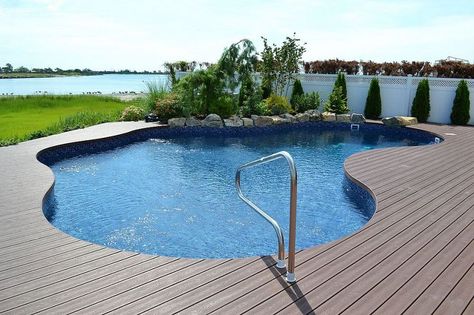 Considering the beautiful vistas open to this home, maximizing views was an important factor in every part of our design. www.deckandpatio.com Solar Pool Heater Diy, Decks Around Pools, Trex Decking, Pool Decking, Wood Decking, Deck And Patio, Plastic Lumber, Deck Makeover, Vinyl Pool